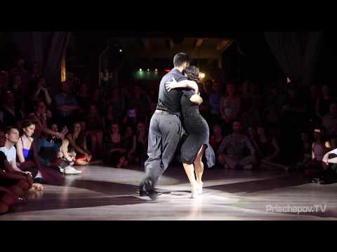  Dana Frigoli  and  Adrian Ferreyra  are  dancing  to  the  milonga  "  El Barrio Del Tambor  "  by  Aníbal Troilo  at  Planetango Moscow  in  2018
