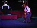  Roxana Belmonte  and  Fabian Belmonte  are  dancing  to  the  milonga  "  Milonga Sentimental  "