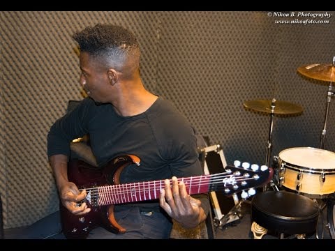 Tosin Abasi testing the Liuteria GNG Brea Dr. Viossy Absynth Amaranth