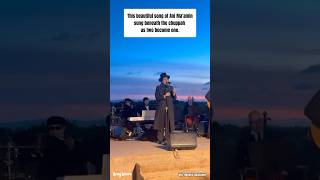 Singer Motty Steinmetz singing beautifully under the chuppah