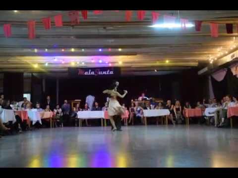  Adrian Ferreyra  and  Martina Ameglio  are  dancing  to  the  tango  "  Pescadores de Perlas  "  by  Florinda Sassone
