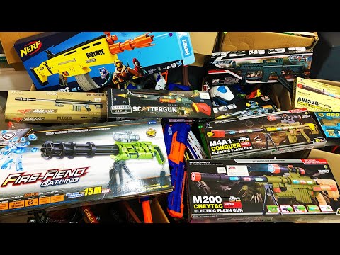 A lot of toy gun boxes - Toy weapons - Pistols - Rifles
