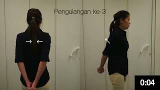 Senaman tulang belikat dengan tangan di pinggang