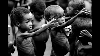 Aus-Rotten - The World Bank w/ Lyrics