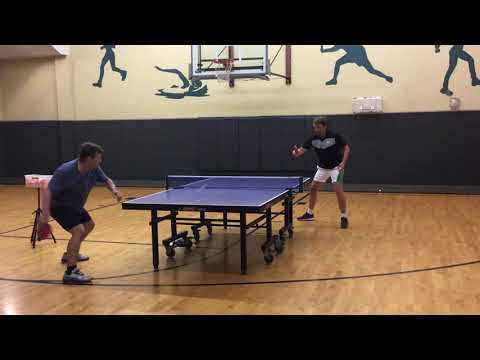 Coach Peter playing with 2003 world Champion Werner Schlager