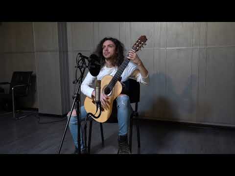 Andrei Oprisan European Spruce/madagascar rosewood  back and sides concert guitar  clip 1 Neumann