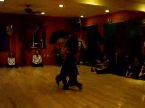  Luciana Valle  and  Alex Krebs  are  dancing  to  a  tango