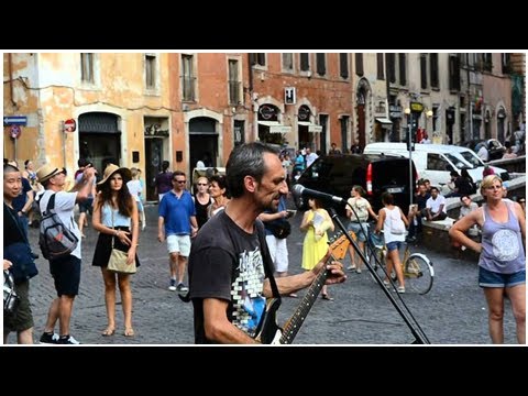 Street Musician Performs Brilliant Covers of Classic Pink Floyd Songs In Front of the Pantheon in R
