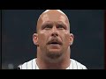 Kane douses "Stone Cold" Steve Austin in a dark liquid