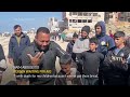 Hundreds wait for aid amongst ruins of Gaza City - Video