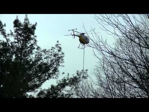 Aerial Saw. Aerial Solutions in Action. Helicopter Tree Trimming. Hughes 500D.