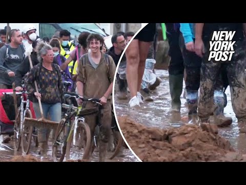Volunteers arrive to help flood relief efforts in Paiporta, Spain