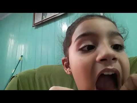 Como arrancar dente de leite com fio dental