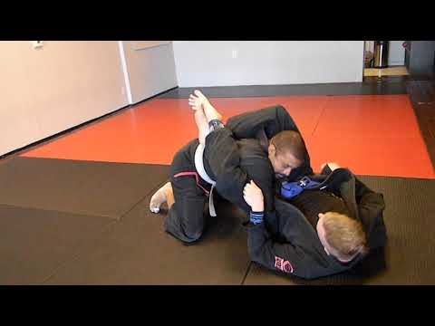 Tommie and Eddie w/Omoplata to triangle