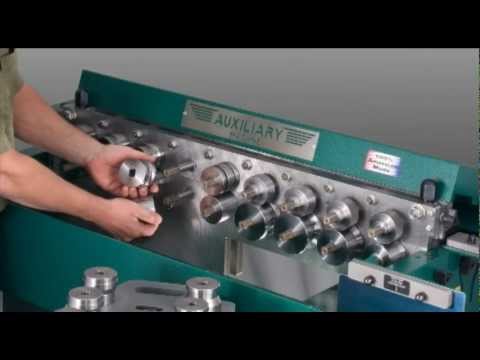 Auxiliary sheet metal fabrication machine