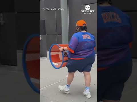 Knick fan returns stolen trash can