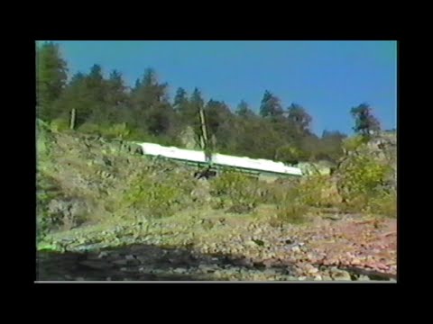 1081. AMTRAK # 14 from below CLIFF at Frazier Oregon on June 3 1989 with 2 passenger engine motive