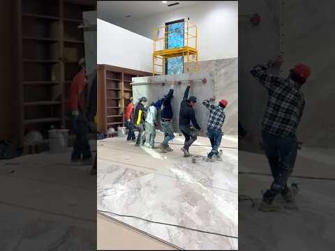 Ever wondered how these monster tiles are installed? Meet Volvy from Top Layer Tile Installation