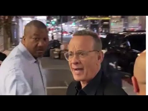 Tom Hanks yells at fans to 'back the the f    off' after wife Rita Wilson nearly knocked over