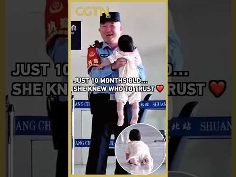 10-month-old baby crawls to Chinese police officer for a hug