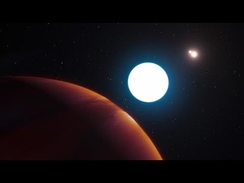 Massive Planet Found Within a Triple-Star System