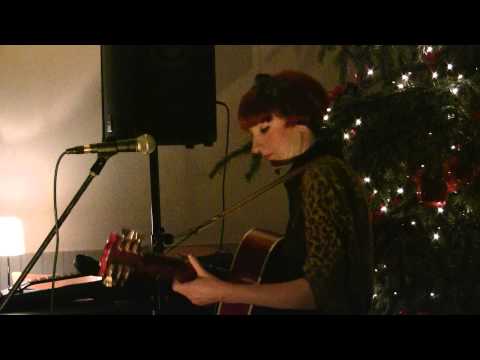 Suzy Indygo performing one of her songs on the acoustic eve at The Wild Boar, Warwick
