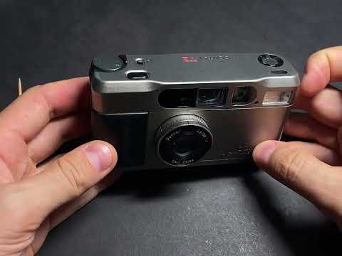 CONTAX T2 FULLY DISASSEMBLED AFTER 2 REPAIRS AND 5 REPAIRMANS CONTAX T2 FULLY DISASSEMBLED AFTER 2 REPAIRS AND 5 REPAIRMANS