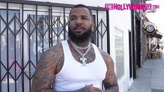 The Game Gets Emotional Over Nipsey Hussle&#39;s Passing While Getting A New Tattoo On Melrose Ave.