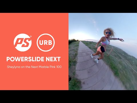 Sheylyna skating on the beach with her Next Marble Pink 100