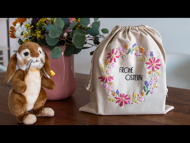 Osterbeutel Blumenkranz mit Frühlingsblumen - Stickanleitung