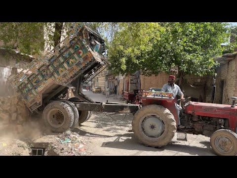 Tractor Unloading Bricks in Peshawar Pakistan