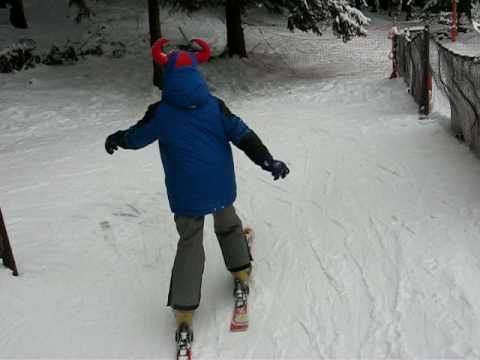JACK skiing in ROMANIA in Brasov City on "Bradul" ski slope with his romanian Ski Instructor