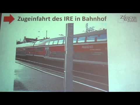 Deutsch lernen A1 - Zugeinfahrt des IRE in Bahnhof