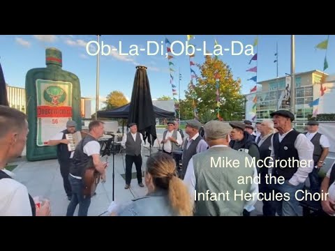 Ob-La-Di, Ob-La-Da being sung by Mike McGrother and the Infant Hercules Choir