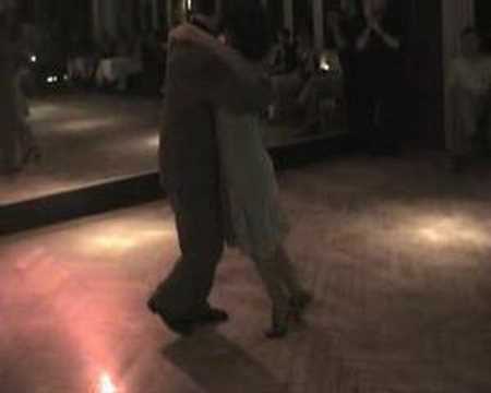  Gustavo Benzecry Sabá  and  Maria Olivera  are  dancing  to  the  tango  "  Tierriti  "
