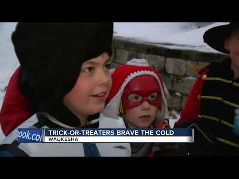 Despite cold and snow, trick-or-treating continues in Waukesha
