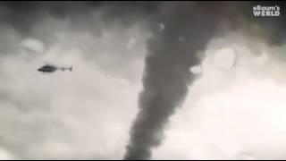 Helicopter Gets Sucked Into A Tornado Man Falls Out