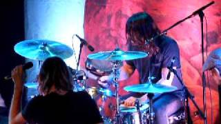 Dave Grohl plays drums and sings backup for Taylor Hawkins