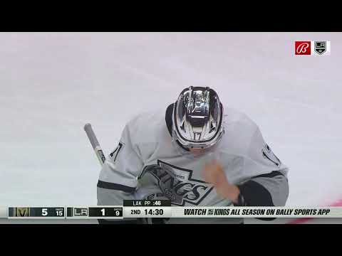 Viktor Arvidsson runs into Lias Andersson in front of the Golden Knights net.