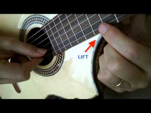 How to produce Natural harmonics on the classical guitar