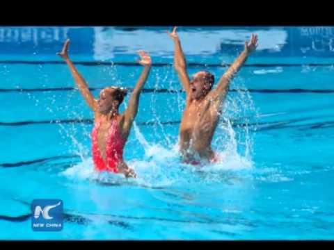 US swimmer becomes the first male to win FINA' s synchronised title