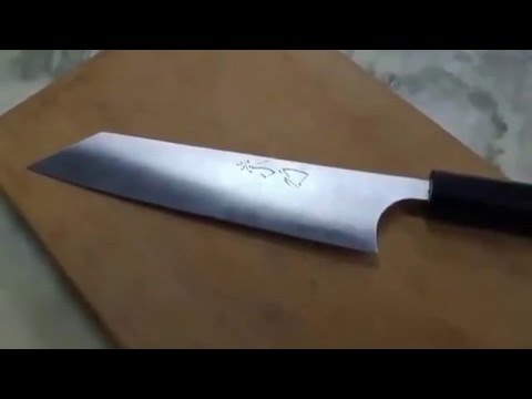 This knife cuts all / Dieses Messer schneidet alles
