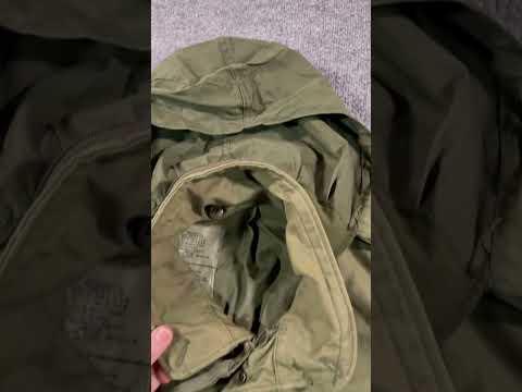 90s cold weather gear OG 107 field jacket with patches and hood.