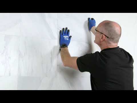 Part of a video titled How to install PVC Bathroom Wall Panels - YouTube