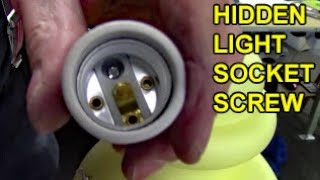 Light Socket Removal Screw Releases Socket from Housing of Fixture