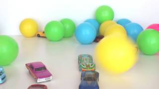 Crazy plastic colored balls are falling onto the car toys | Video for kids