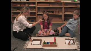 Montessori 1st Presentation Introduction of Two-digit Multiplication with the Stamp Game