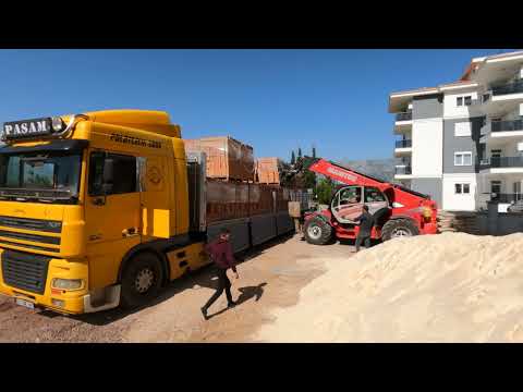Manitou MT X 1840  With, In our construction, we extended and carried the bricks to the upper floors