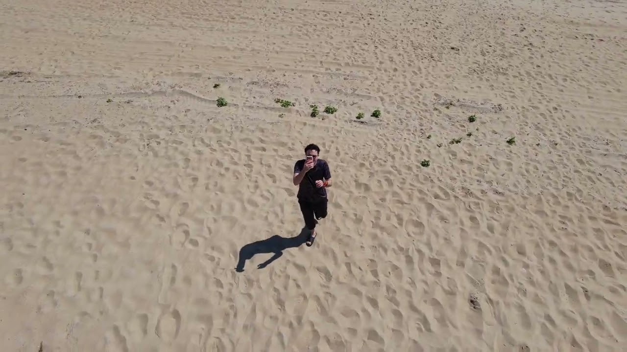 HOVERAir AQUA Tracking Person on Beach - YouTube