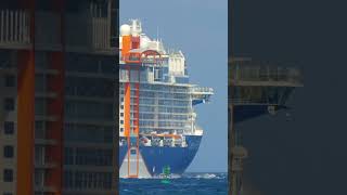 The Celebrity Beyond cruise ship with its signature "Magic Carpet," an elevator between decks